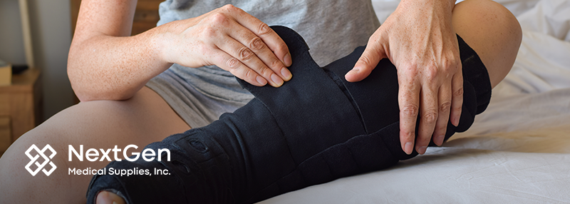 Person putting on a lymphedema compression sleeve on their leg.
